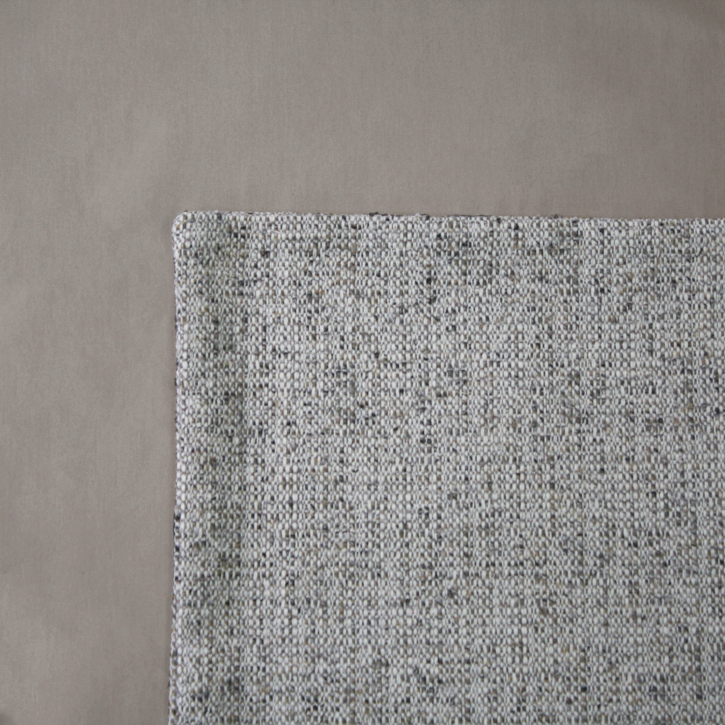 Stone Tweed Cushion Cover on a Dune Duvet Cover