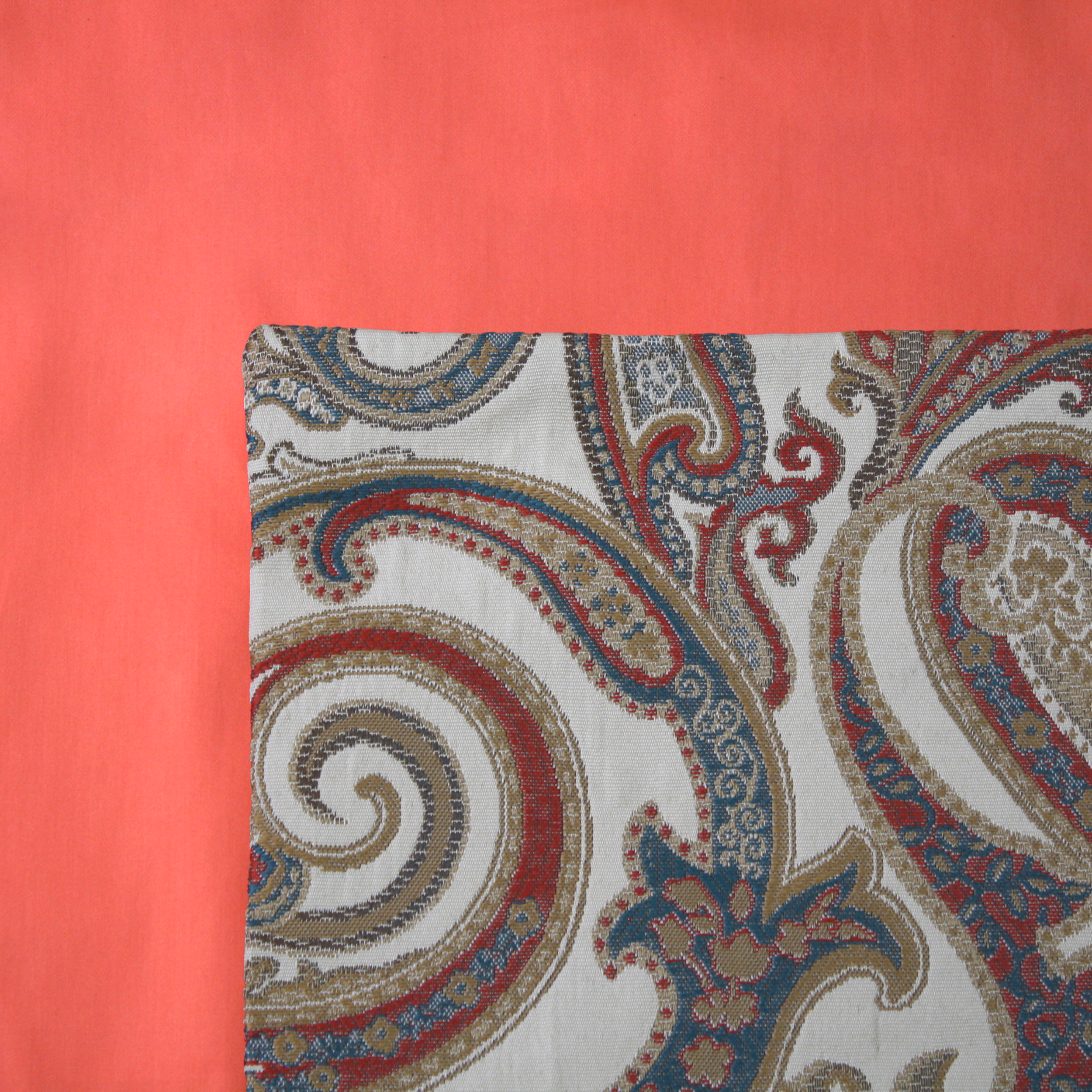Carnival Cushion Cover on a Persimmon Duvet Cover