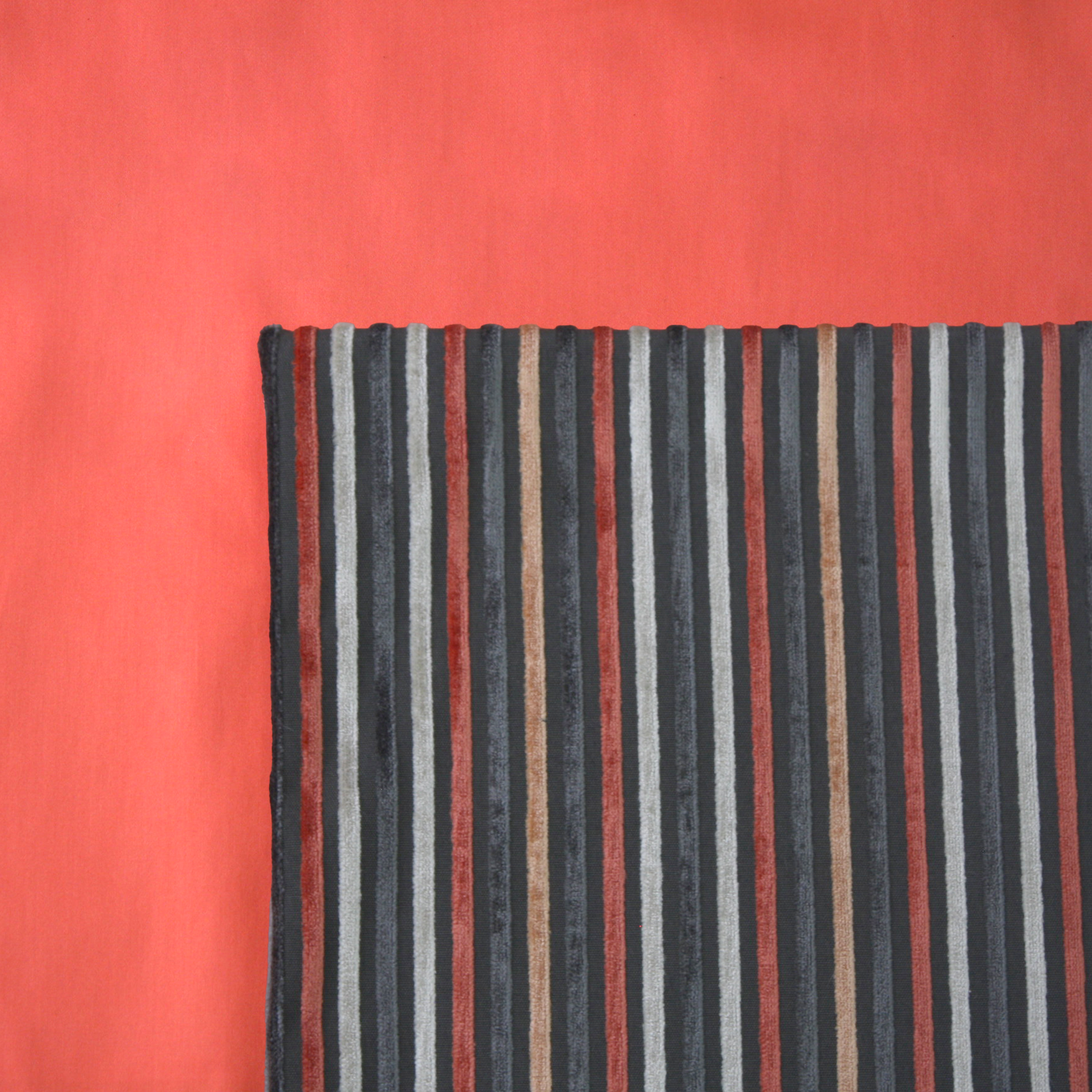 Sizzle Cushion Cover on a Persimmon Duvet Cover