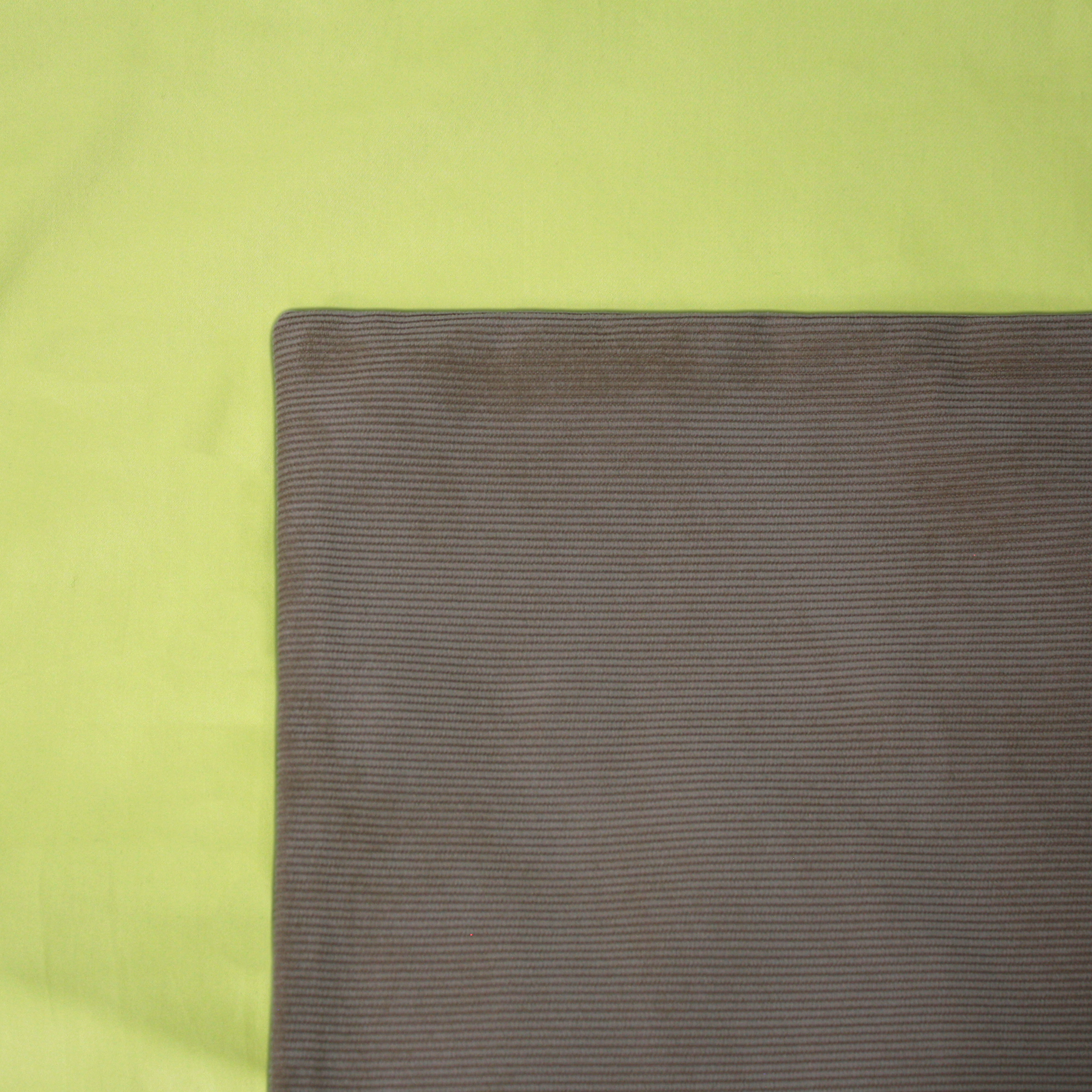 Woodland Cord Cushion Cover on a Pistachio Duvet Cover